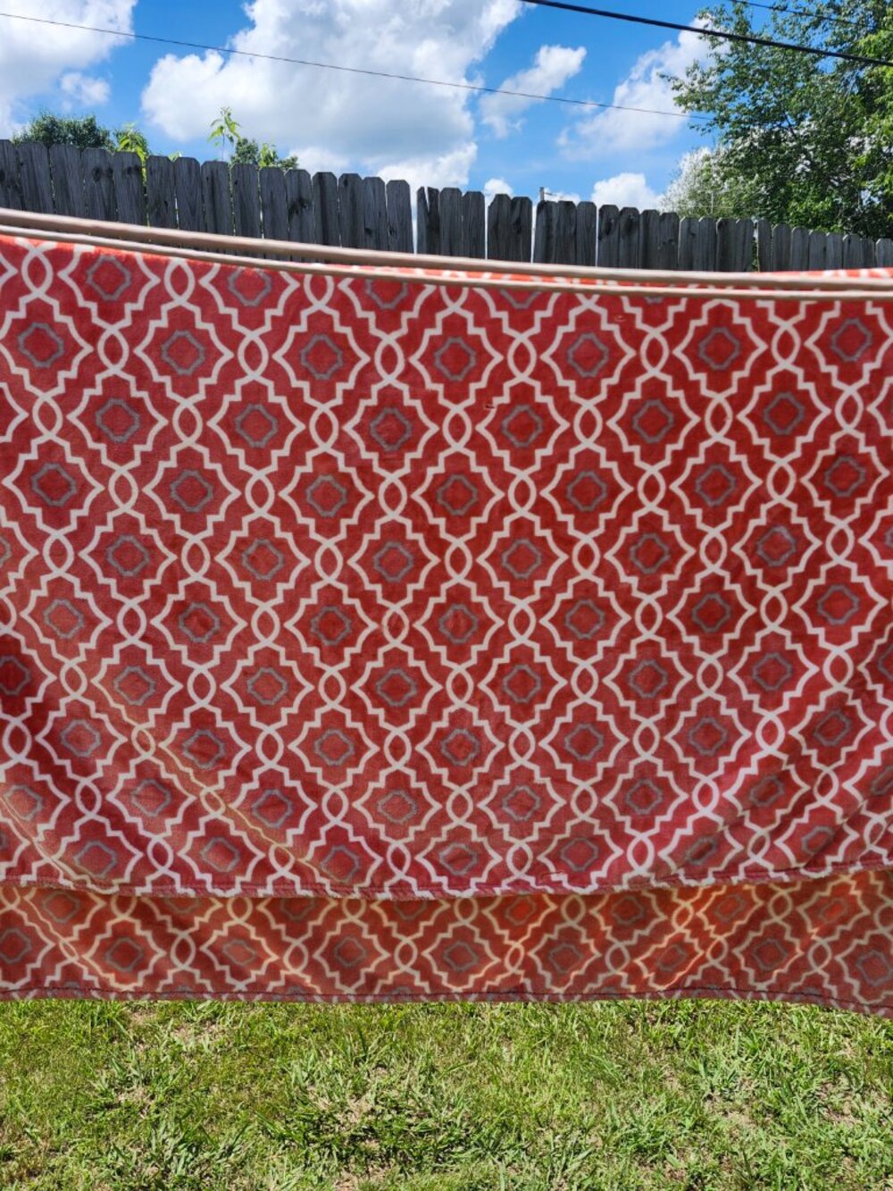 orange/white damaged throw fleece blanket  68 x 60 inches